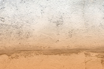 Old concrete surface close-up. Abstract background brown color toned