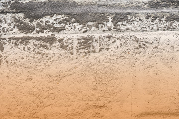 Old concrete surface close-up. Abstract background brown color toned