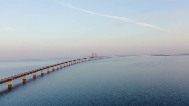 Oresund bridge. A long tunnel bridge with an artificial island between Sweden and Denmark., Aerial View Hyperlapse