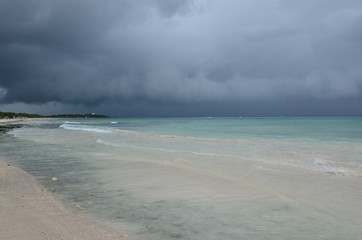 The beach and sea before storm