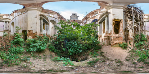 Fototapeta premium Full spherical seamless hdri panorama 360 degrees angle view inside of concrete structures of abandoned ruined building of church with bushes and trees inside in equirectangular projection, VR content