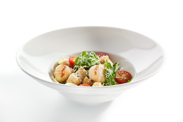 Delicious natural caesar with scallop closeup