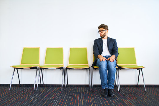 Stressful young man waiting for job interview