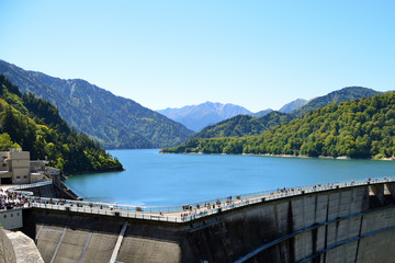 Fototapeta na wymiar Kurobe Dam lake and mountains in the northern Japan Alps