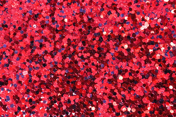 Red glitters. Small colour shiny plexi pieces.