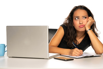 woman with laptop and pencile