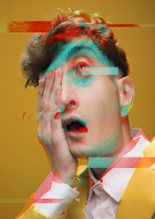 Close-up portrait of a man making funny faces in glitch effect