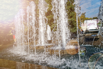 Fountain in park with splash water stream