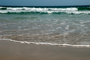 Kangaroo Island Australia, water's edge with waves breaking at Stokes Bay
