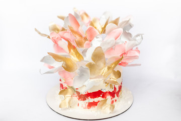 A wedding cake. Festive white cake with butterflies.