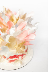 A wedding cake. Festive white cake with butterflies.