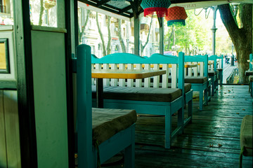 Stylish interior of a cozy cafe, handicraft furniture