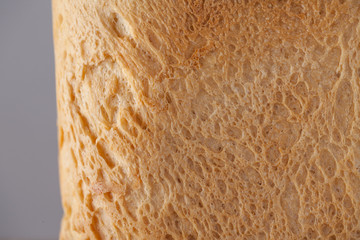 bread texture. Grey background.