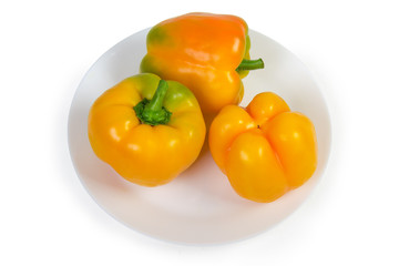 Top view of the yellow bell peppers on the dish