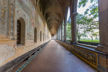 Decorated walls in the corridor of cloister of the Clarisses in Santa Chiara Monastery, Naples,...