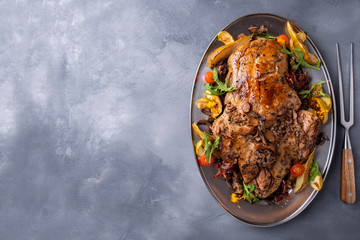 Whole baked duck stuffed with buckwheat and mushrooms. Copy space. Top view.