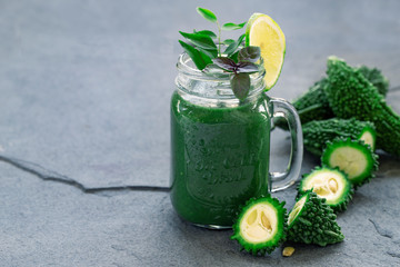 Green bitter gourd for concept design. Organic nutrition healthy food. Medical background. Diet...