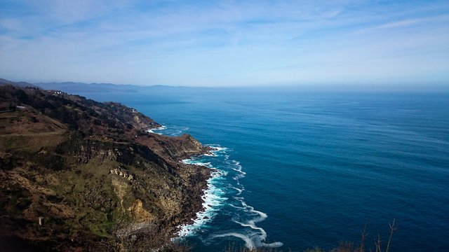 Baque country coast, sea and rocks in a cloudy day of autumn