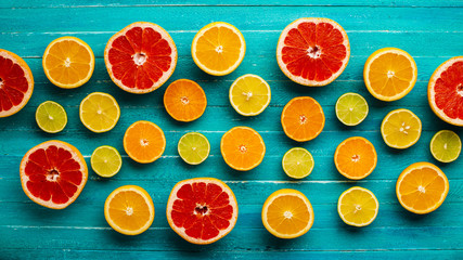 Top view mixed citrusses on table