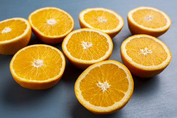 Fototapeta na wymiar High angle fresh oranges on table