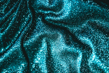 Emerald holiday sparkling glitter abstract background, luxury shiny fabric material for glamour design and festive invitation © Anneleven