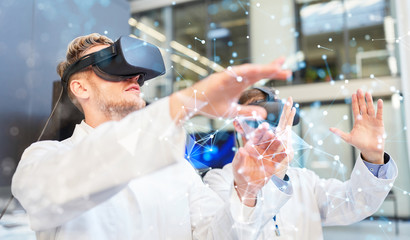 Two doctors with virtual reality glasses in training