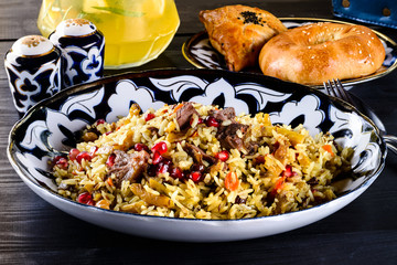 traditional pilaf with meat and pomegranate