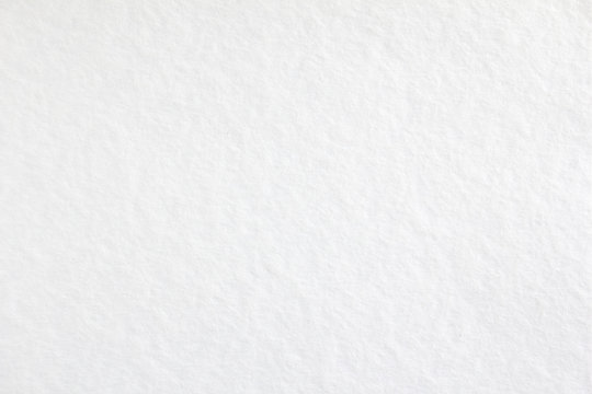 White blank sheet of drawing paper with rough surface texture background.
