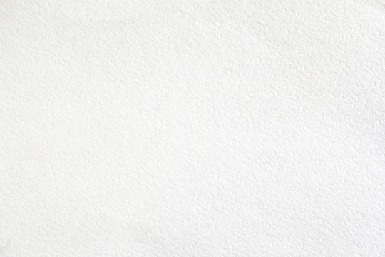 White sheet of thick drawing paper with rough surface texture background.