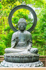 Seated Bronze Buddha on Lotus at San Francisco Japanese Garden.