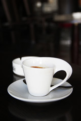 The cup of coffe in art deco style