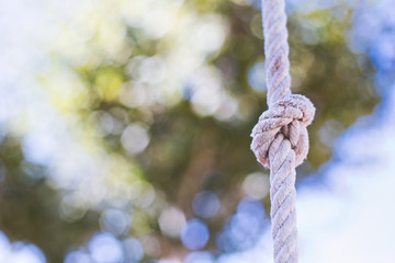 Ancient rope forming a knot.