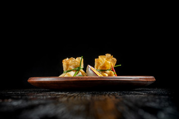 Pancakes stuffed with soyce and hot pepper. With delicious granadilla.