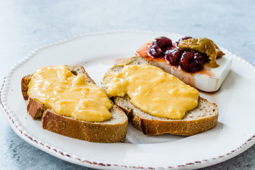 Scrambled Eggs with Bread Slice, Cheese and Jam / Marmalade.