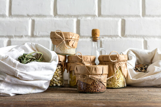 Vegetables and groceries in the kitchen. Storage in ecological friendly dishes, concept of zero waste and no plastic