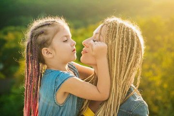 Happy family and lovely mom and daughter spend time together - mothers day. Mother and daughter....