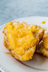 Scrambled Eggs with Croissant. Creamy Style.