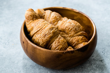 Freshly Baked Croissants in Wooden Bowl. Bakery Concept.