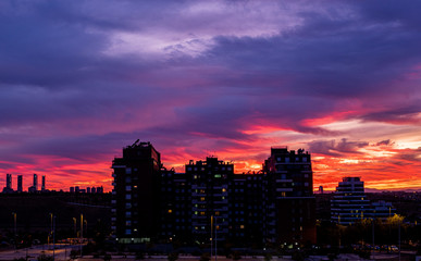 Obraz premium View of the sunset from Valdebebas with Madrid's four towers in the background
