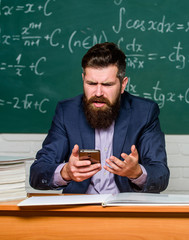 Whats wrong with phone. Businessman try to buy online on phone. Cyber monday. Teacher use mobile...