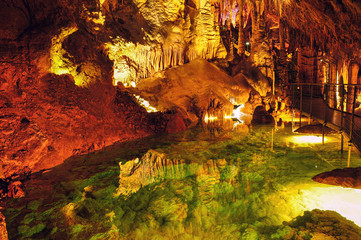 Caves in France. Grandes Canalettes in the French Pyrenees. Amazing view on stalactites in colorful...