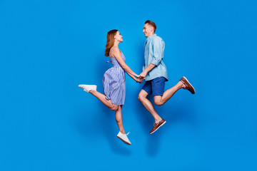 Full length body size profile side view of her she his he two nice attractive dreamy cheerful glad...