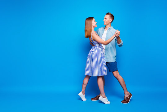 Full length body size view of her she his he two nice-looking attractive charming cheerful people dancing waltz isolated over bright vivid shine vibrant blue turquoise color background