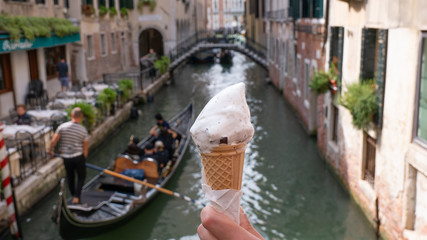 Fototapeta na wymiar an ice cream in the background gondola in venice