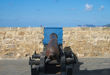ancient cannon on the bastion, Alghero, Sardinia, Italy