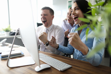 Group people in office correctly solved problem and shout yes we won. Business staff succes...