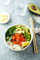 Salmon poke bowl with avocado