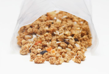 Granola with fruits and nuts. Baked muesli mix. Super food concept. Breakfast cereals. Kids diet. White isolation background.	