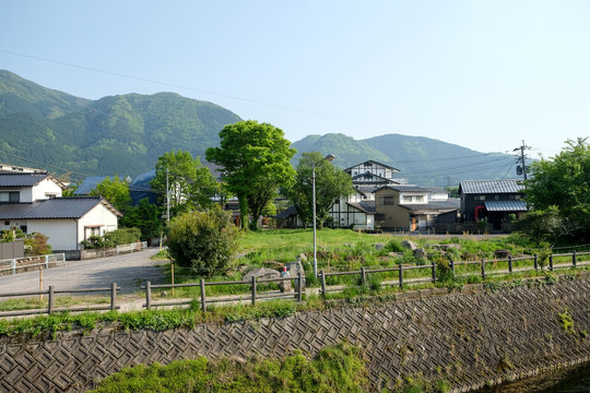 Landscape view of yufuin city with Mount Yufu in Background and clear sky  in summer. onsen town, Yufuin, Oita, Kyushu, Japan