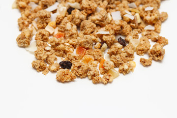 Granola with fruits and nuts. Baked muesli mix. Super food concept. Breakfast cereals. Kids diet. White isolation background.	